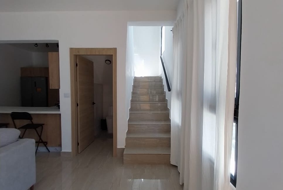 En Venta Exclusivo Townhouse con zona de BBQ , piscina y acceso privado a la playa a 15 minutos del aeropuerto en Punta Cana República Dominicana